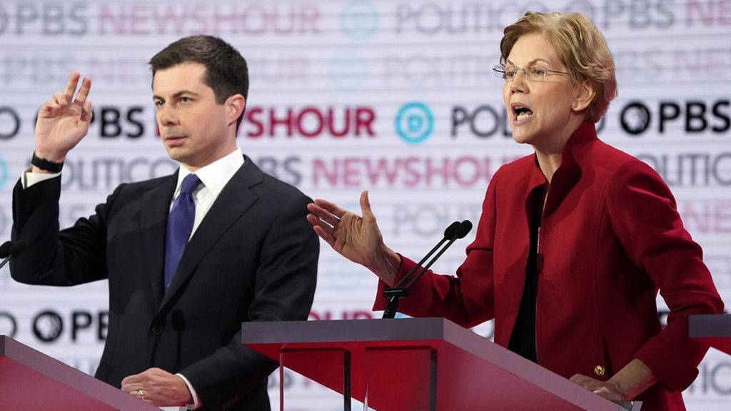 Pete Buttigieg and Elizabeth Warren on stage during the debate