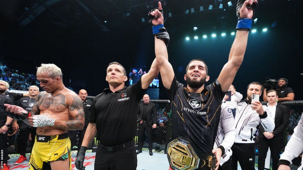 Islam Makhachev celebrates beating Charles Oliveira after their first fight in October
