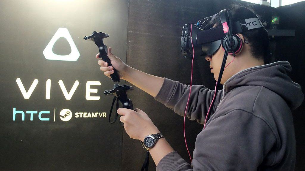 Man using HTC Vive VR headset
