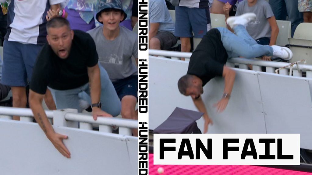 Fan falls over railings attempting catch at Edgbaston