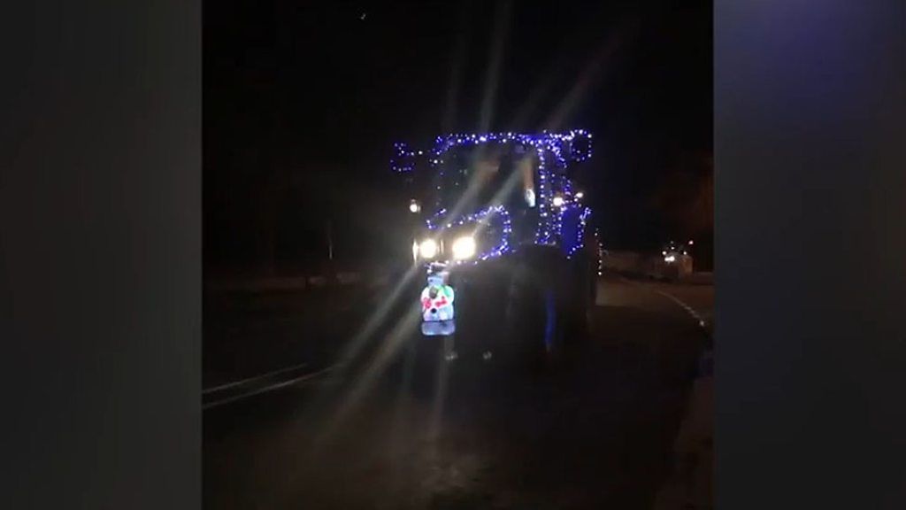 Tractor decorated in Christmas lights