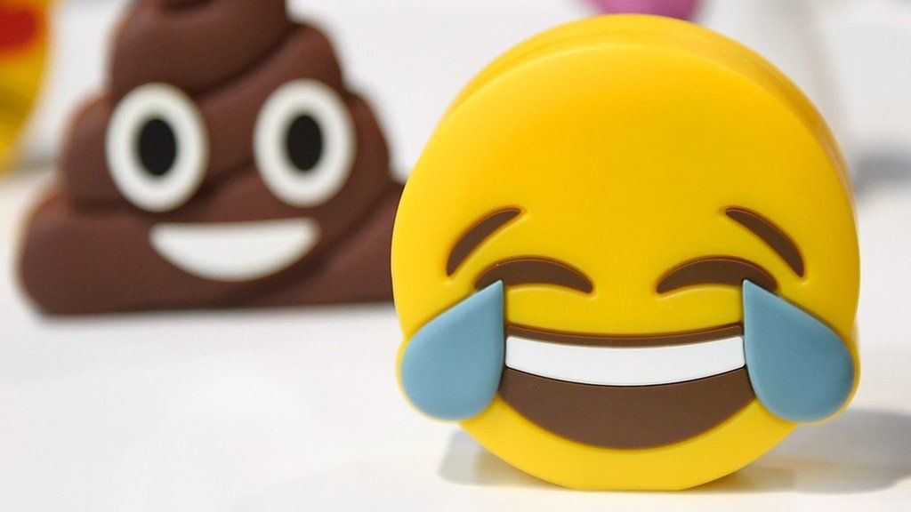 Laughing face and poo emoji