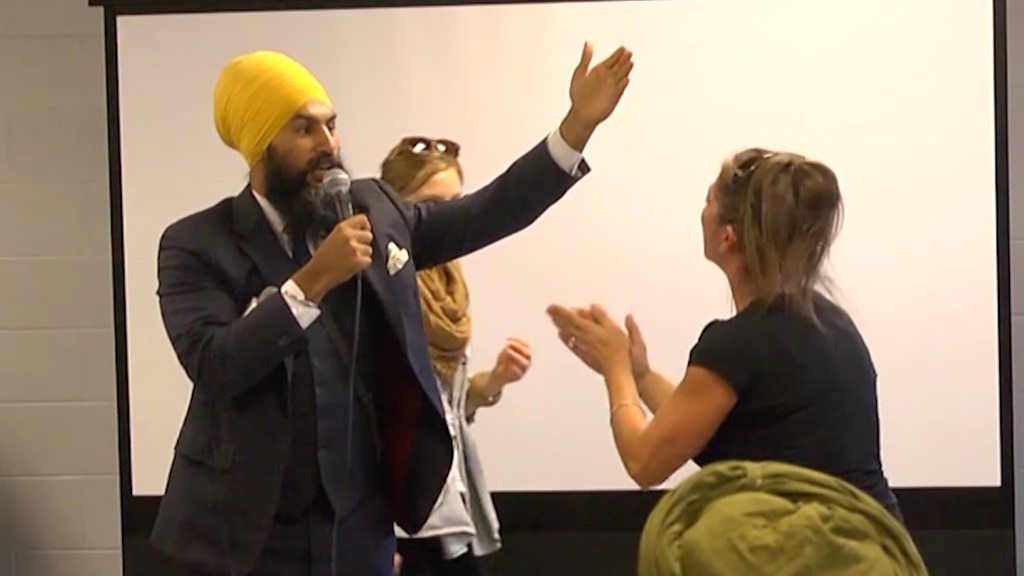 A Canadian Sikh politician is being praised for his response to an angry heckler who accused him of supporting Sharia law