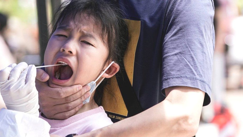 Boy being held for swab test in Wuhan