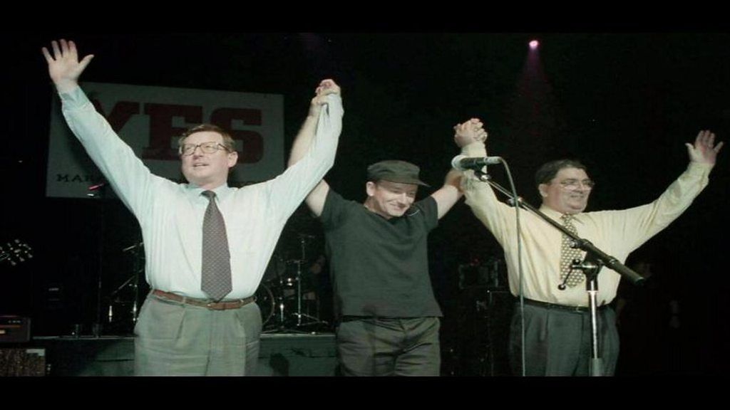 Ulster Unionist leader David Trimble pictured on stage with U2 singer Bono and SDLP leader John Hume at the Concert for Yes, at Belfast's Waterfront on 18 May 1998