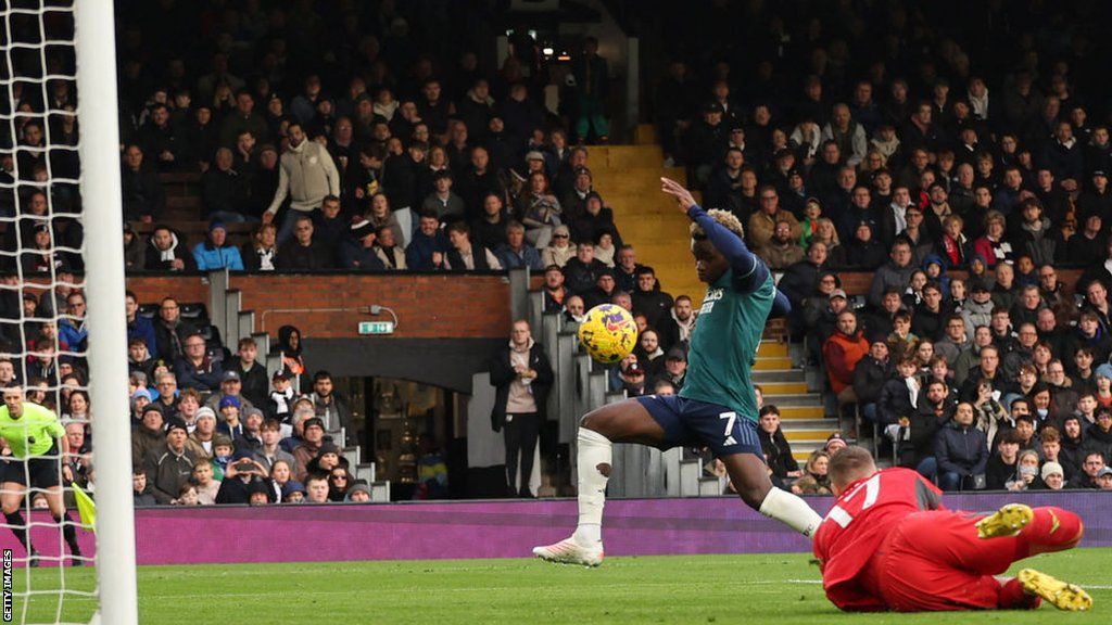 Bukayo Saka scores Arsenal's first goal against Fulham