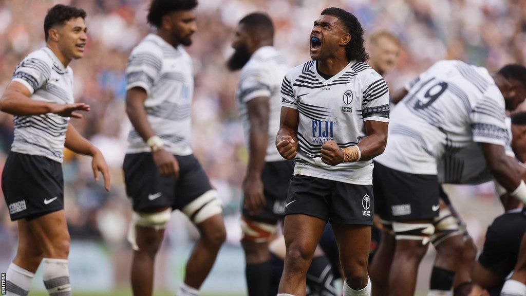 Fiji celebrate victory against England at Twickenham in August 2023