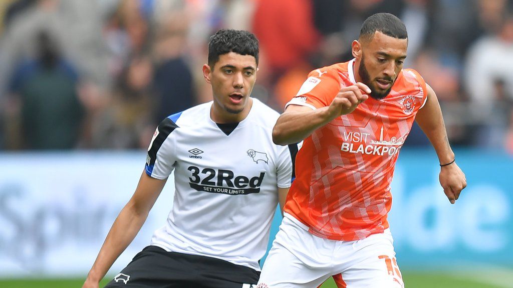 Birmingham City forward Keshi Anderson (right), pictured playing for Blackpool