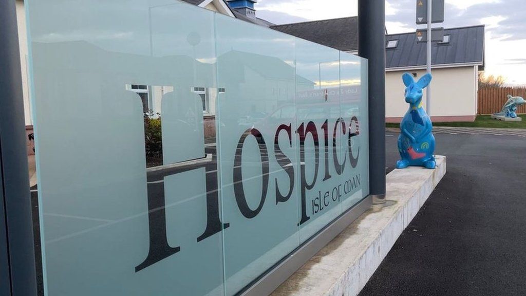 A photo of the Hospice sign