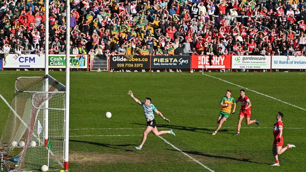 Odhran Lynch is chipped by Daire O Baoill for one of Donegal's goals