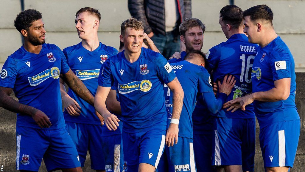 Penybont players celebrate during the Cymru Premier League game with Caernarfon Town in November 2022