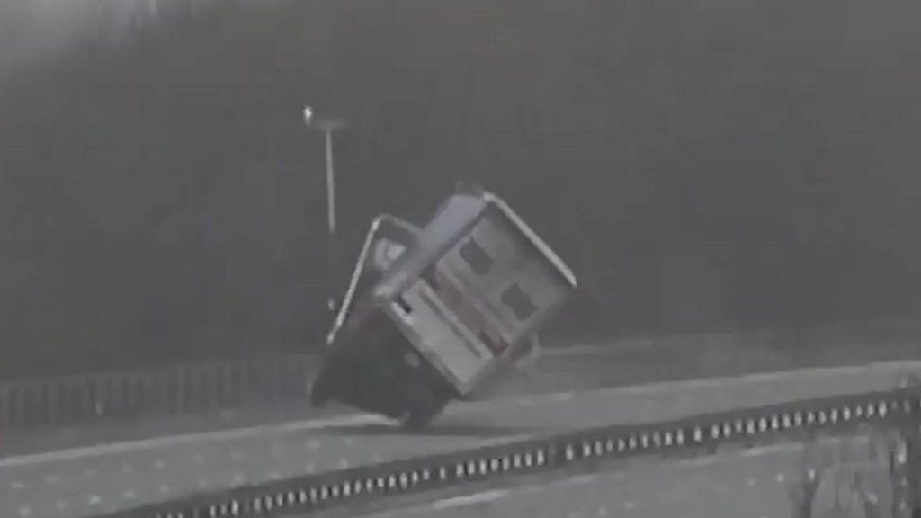 Lorry tips over