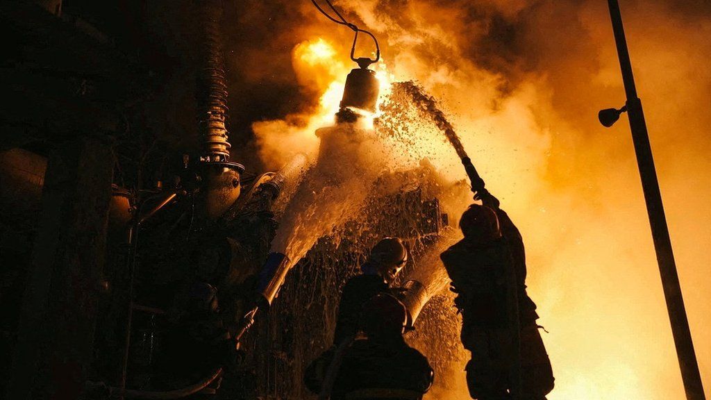 Ukrainian firefighters battle aftermath of Russian air strike