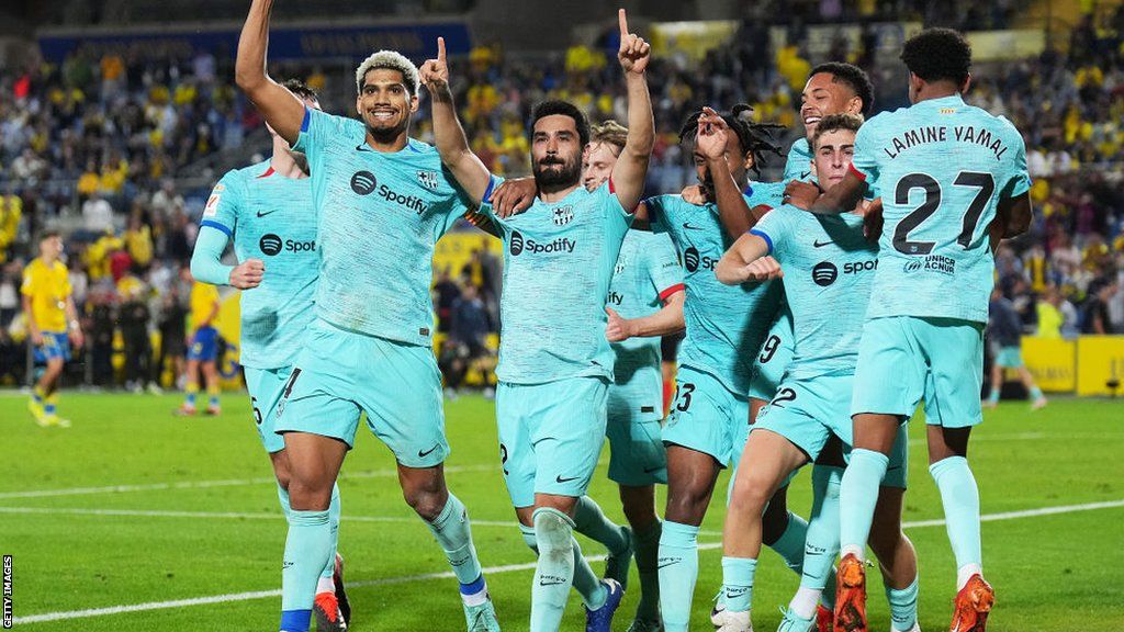 Ilkay Gundogan celebrates with his team-mates