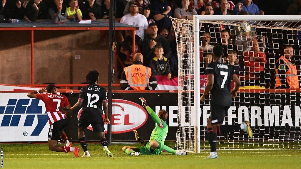 Demetri Mitchell scores Exeter City's winner against Luton Town