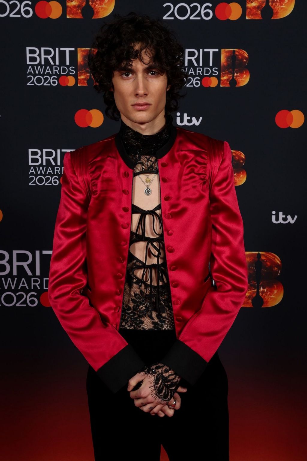 Picture of Sombr in a red jacket