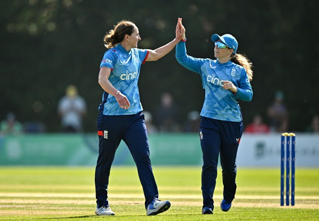 Kate Cross (left) and Tammy Beaumont observe  a wicket against Ireland