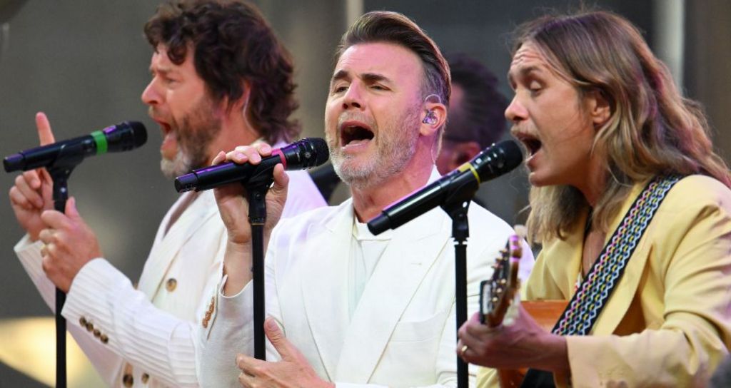 (L-R) Howard Donald, Gary Barlow and Mark Owen of Take That perform onstage at Take That's "Greatest Days" World Premiere at Odeon Luxe Leicester Square on June 15, 2023 in London, England