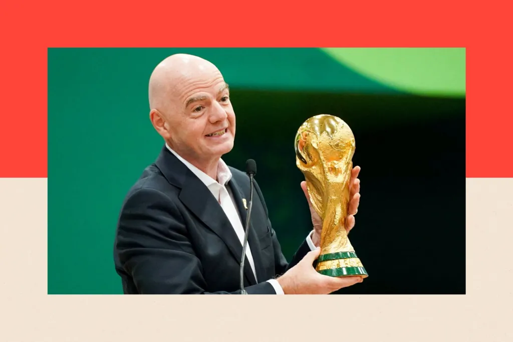 On the left, several hands reach up to hold the FIFA World Cup trophy in black and white. Behind them is a grid pattern with a bold red line that rises and then falls sharply.