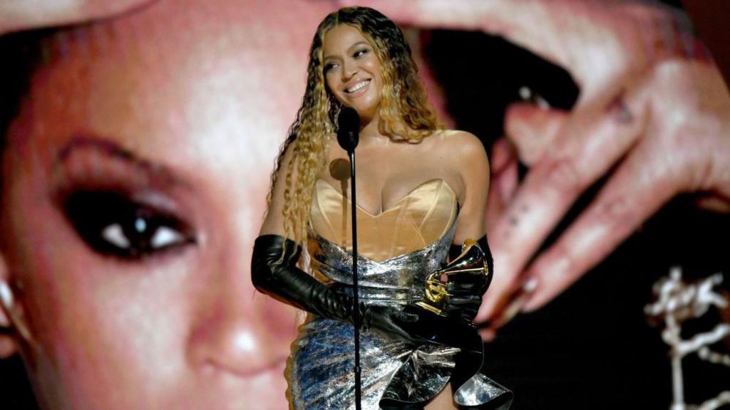 Beyoncé accepts a Grammy Award in 2023