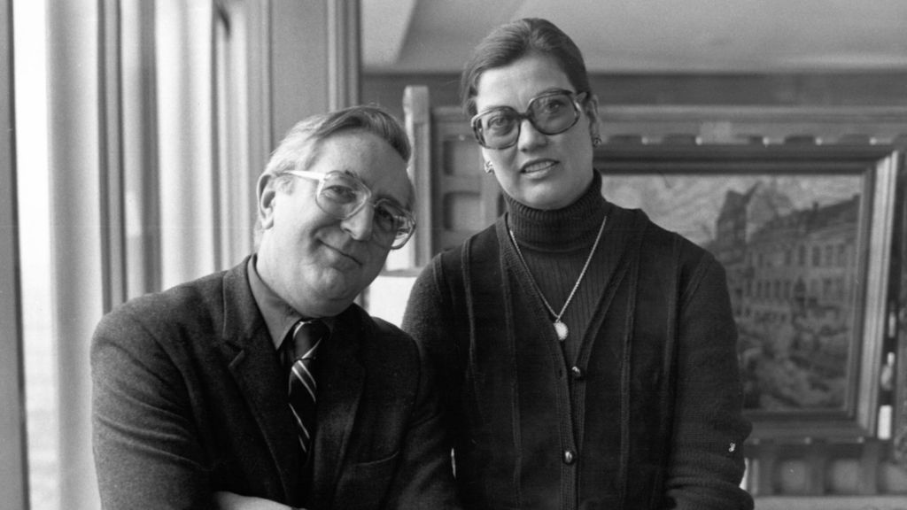 Len Deighton and his second wife, Ysabele, photographed in 1984 . They are both looking at camera and smiling.