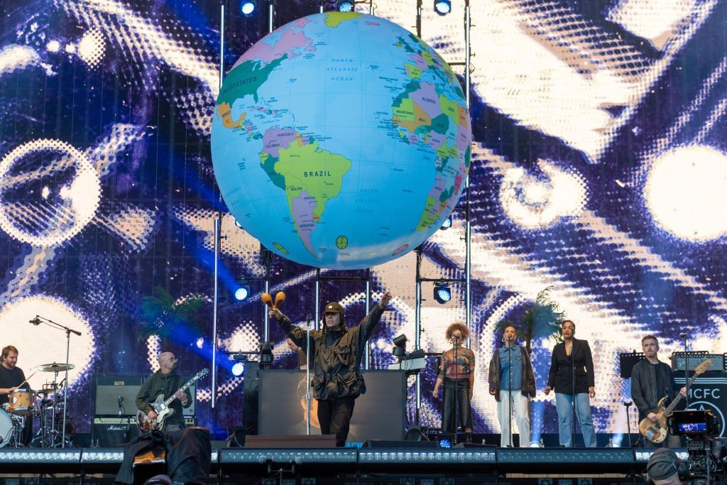 Liam Gallagher on the TRNSMT stage in front of a giant globe