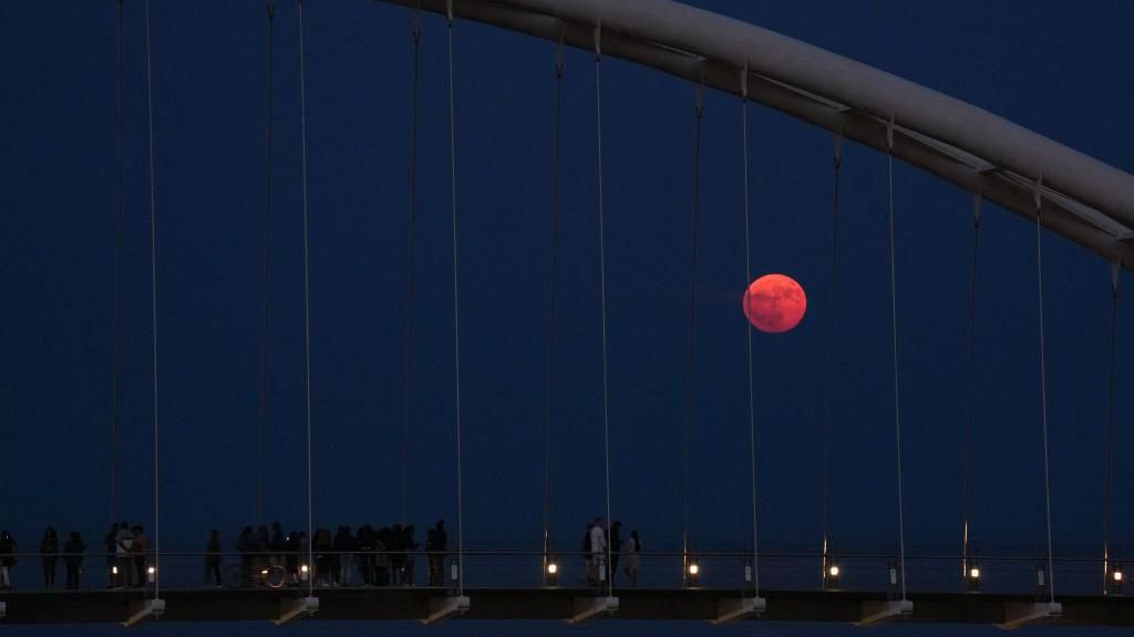 Strawberry Moon: Full Moon rises at famous sites over the world - BBC ...