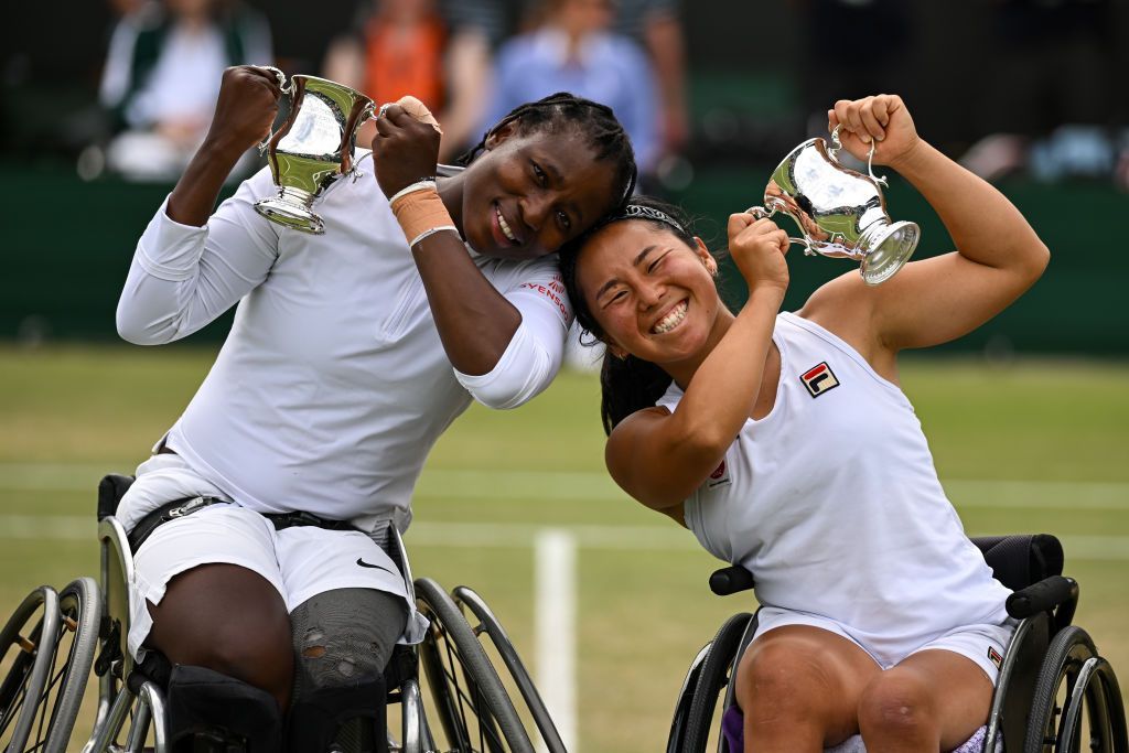  Yui Kamiji of Japan and Kgothatso Montjane of South Africa pose with the Ladies' Wheelchair Doubles Trophy following victory against Diede de Groot of the Netherlands and Jiske Griffioen of the Netherlands in the Ladies' Wheelchair Doubles Final during day fourteen of The Championships Wimbledon 2024 at All England Lawn Tennis and Croquet Club on July 14, 2024 in London, England. (Photo by Daniel Kopatsch/Getty Images)