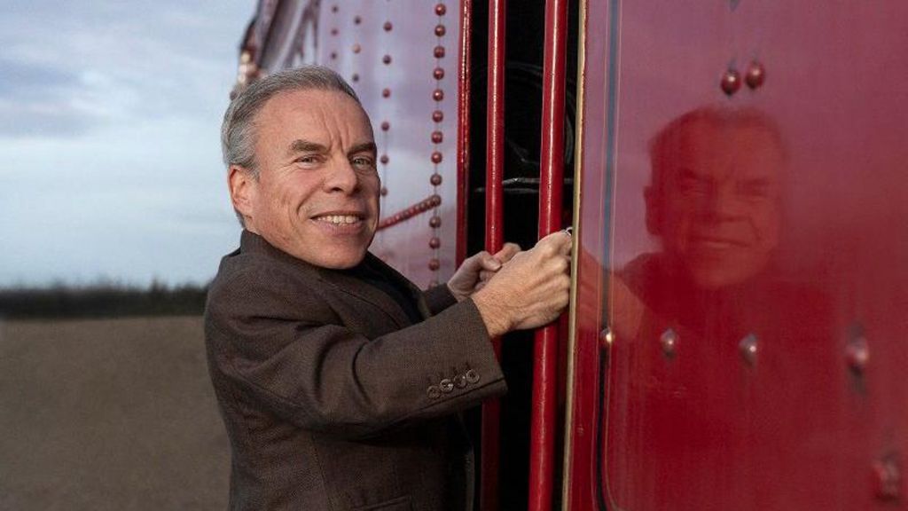 Wawrick Davis boarding a train