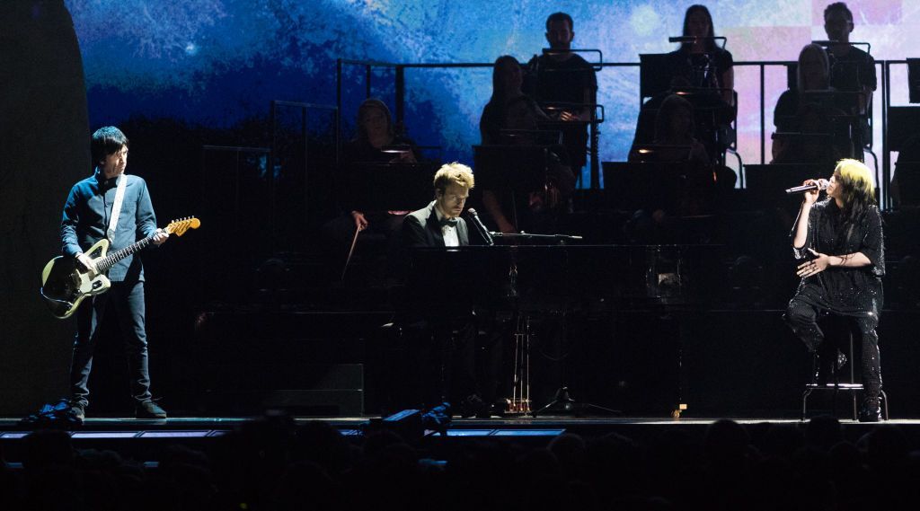 Johnny Marr on stage at the Brit Awards with Billie Eilish and her brother Finneas
