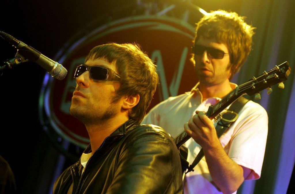 Liam and Noel Gallagher performing in 2001