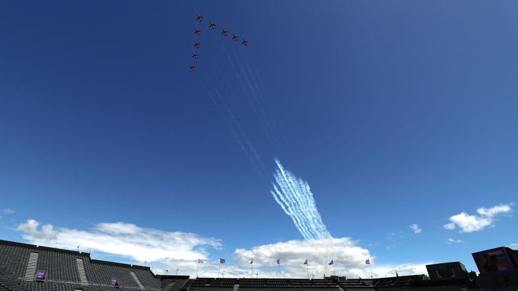 Red Arrows fly over stadium