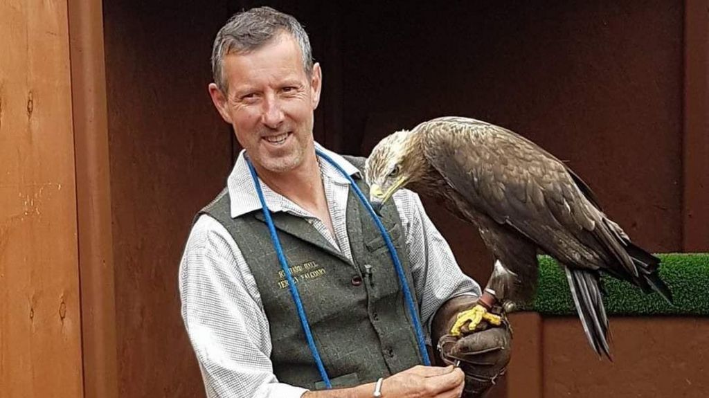 Richard Hall with his eagle Hemlock