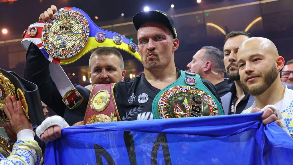 Oleksandr Usyk with his belts