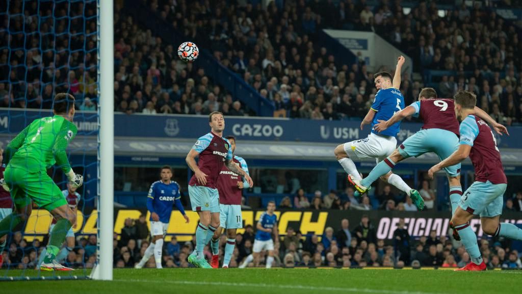 Michael Keane scores with a header against Burnley
