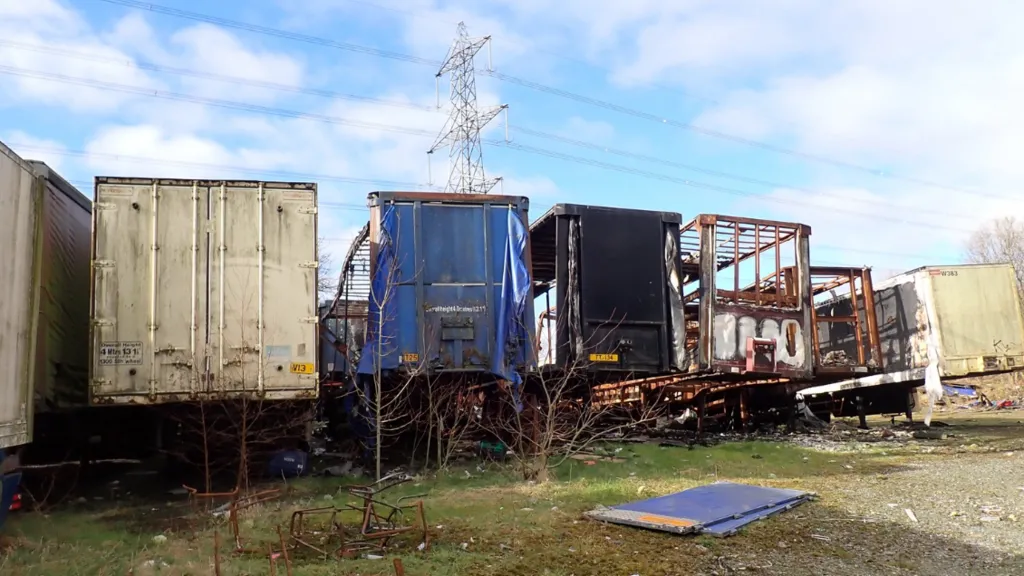 Waste at the site included fire-damaged lorry trailers, the Environment Agency says