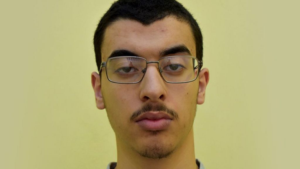 Hashem Abedi. A man with short dark hair, a thin moustache and goatee who is wearing glasses
