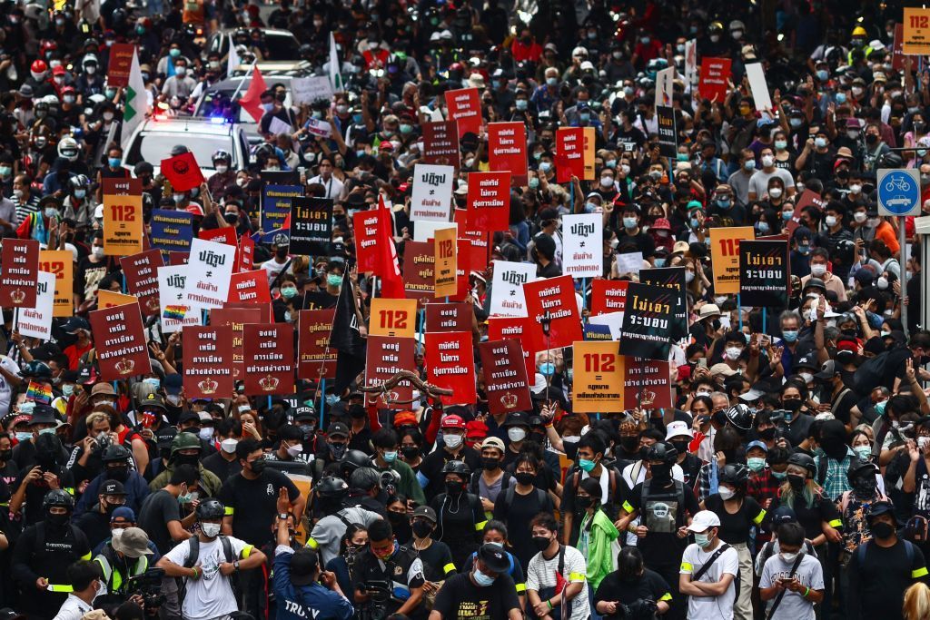 Protesters take part in a demonstration in Bangkok on November 14, 2021, after a Thai court ruled that speeches by protest leaders calling for royal reforms amounted to a bid to overthrow the country's monarchy. 