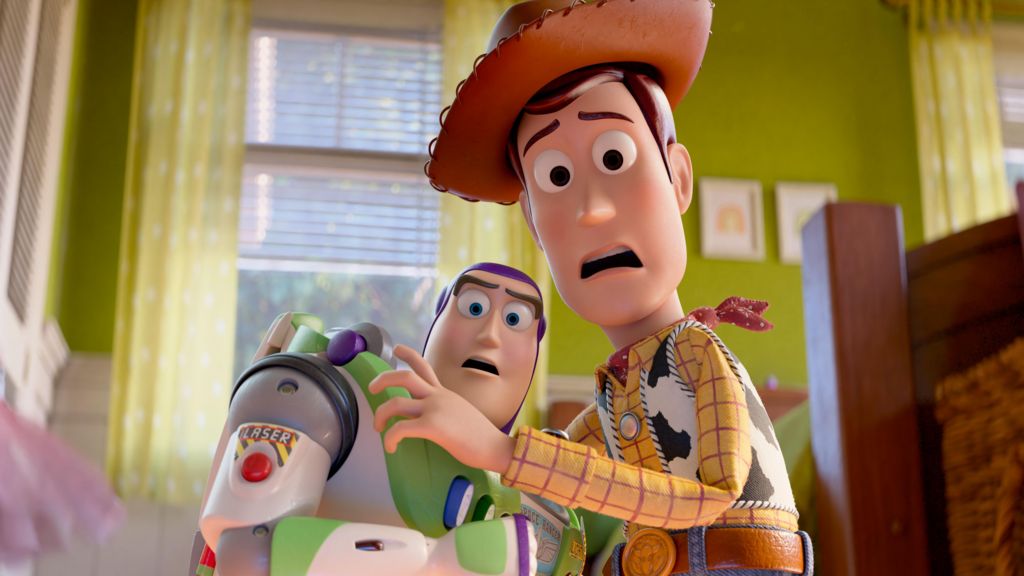 Toy Story toy Buzz Lightyear and Woody in a bedroom in a scene from the film