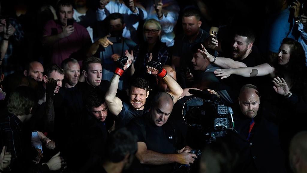 Michael Bisping makes his walk to the cage surrounded by fans