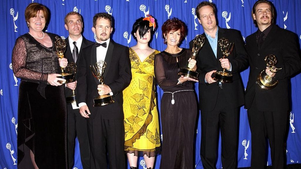 The cast and crew of MTV's The Osbournes pose with their Emmy awards in 2002