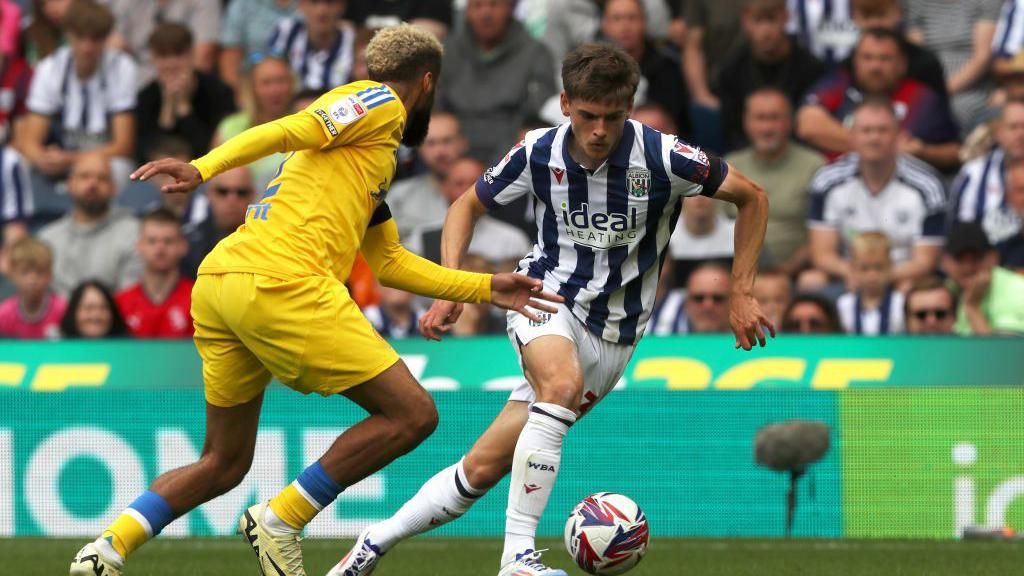 Albion winger Tom Fellows takes on Leeds defender Jayden Bogle at The Hawthorns