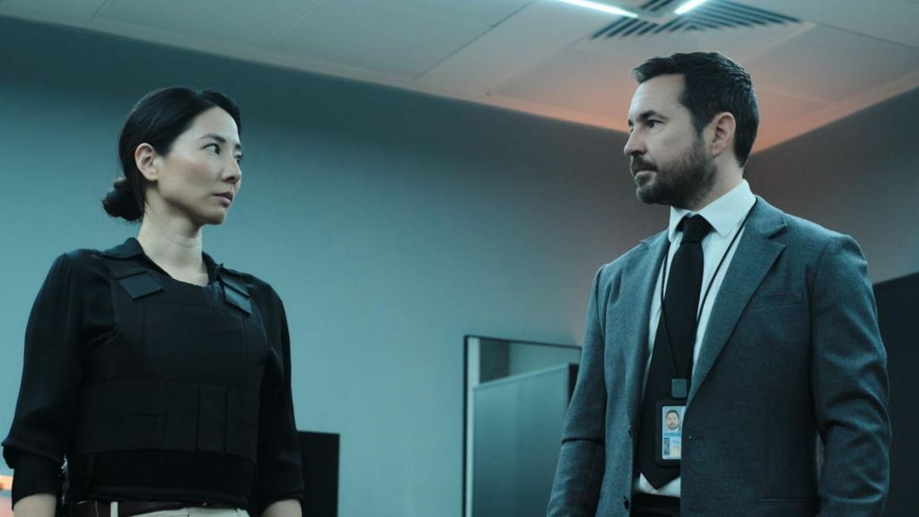 Jing Lusi and Martin Compston in character facing each other in series 2 of Red Eye