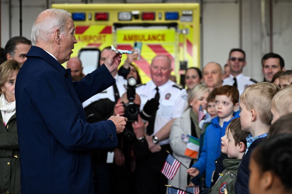 Joe Biden shows children a miniature version of Air Force One after his arrival at Dublin Airport