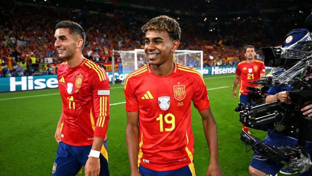 Ferran Torres and Lamine Yamal of Spain celebrate after Spain's win against Italy at Euro 2024