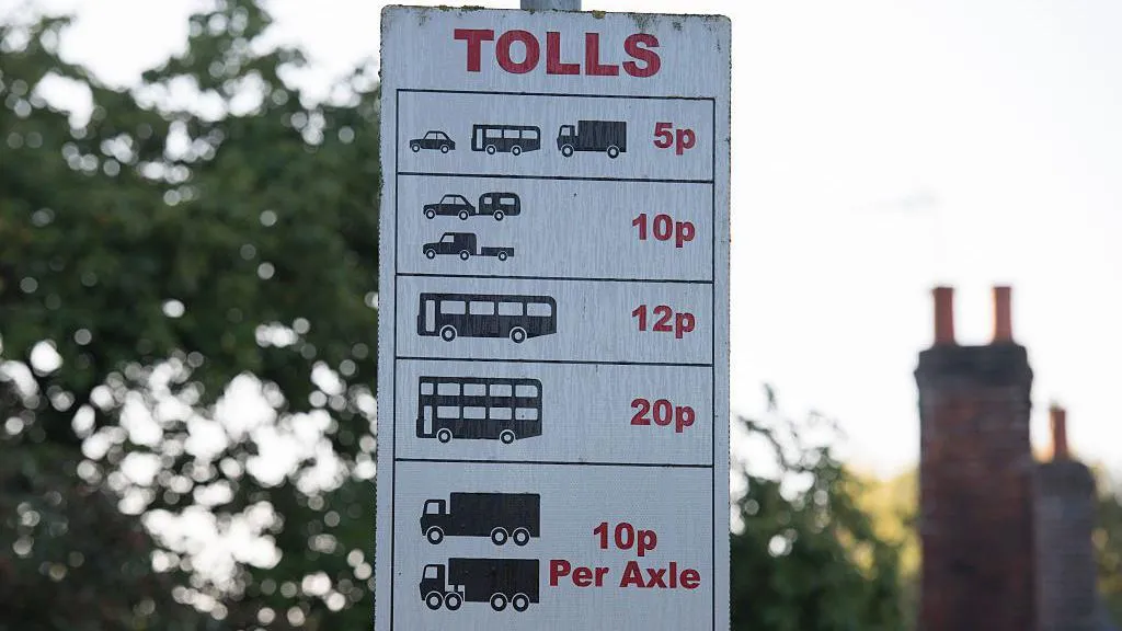 Tolls signs at Swinford Toll Bridge on August 26, 2016 in Eynsham, England.