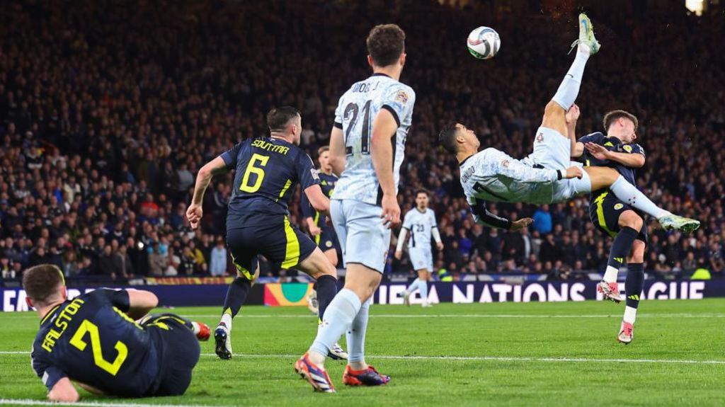 Cristiano Ronaldo attempts overhead kick against Scotland