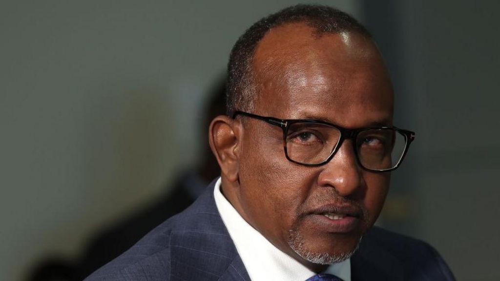 A head-and-shoulders image of Aden Duale. A white collar and dark suit can just be seen at the bottom of the picture.