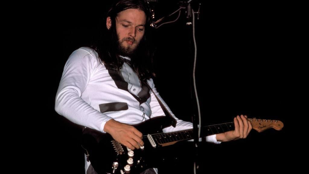 A 1975 image of Gilmour playing the guitar
