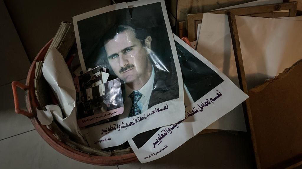 Posters and framed portraits of Bashar al-Assad are seen in the bin at the Ministry Of Information building on December 15, 2024 in Damascus, Syria.